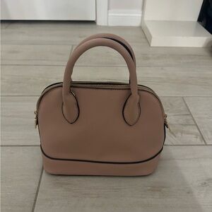 basic light pink purse with gold details